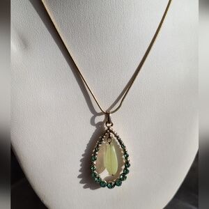 M&S Green cats eye and Rhinestone goldtone teardrop pendant and earrings set